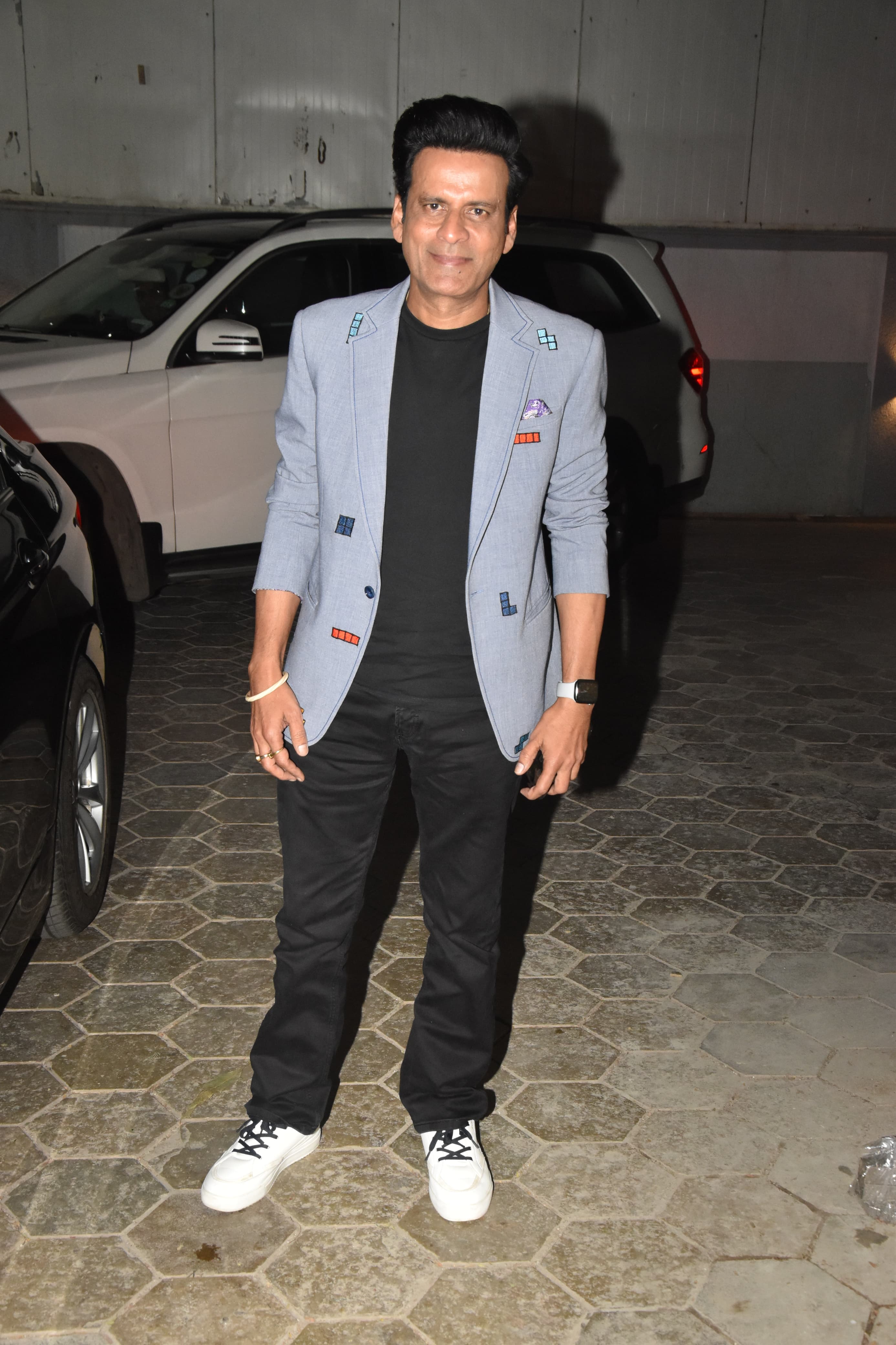 Manoj Bajpayee was snapped in the city wearing a smart blue blazer over a black T-shirt paired with matching jeans