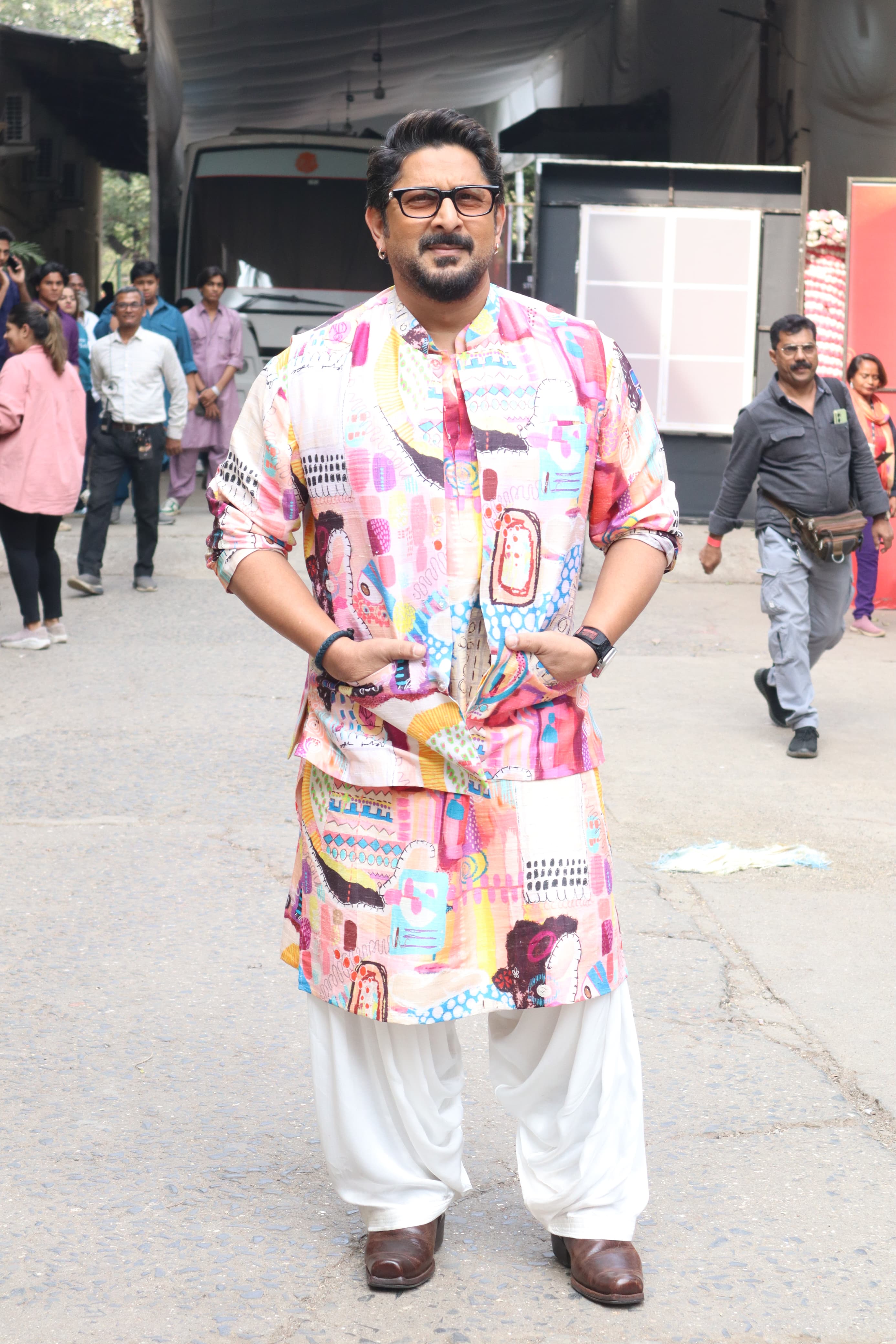 Arshad Warsi chose a multi-colored kurta with white dhoti as he was papped in th city