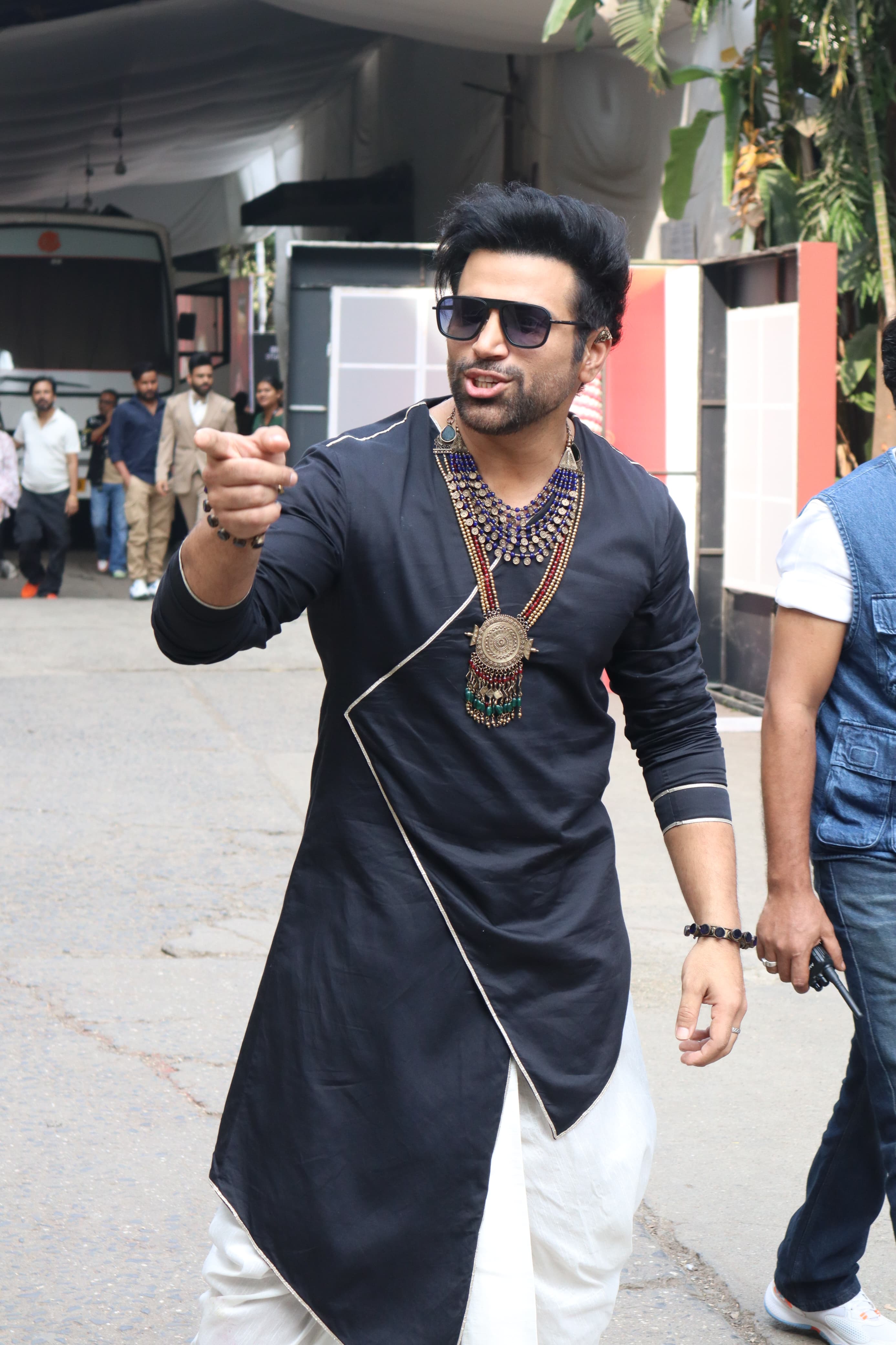 Rithvik Dhanjani opted for a black kurta with white dhoti as he was photographed in the city
