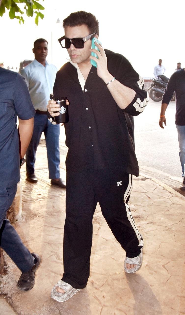 Karan Johar looked super busy as he was snapped in the city