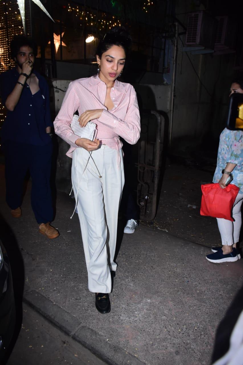 Actress Sobhita Dhulipala was clicked in the city wearing a pretty pink shirt and white pant
