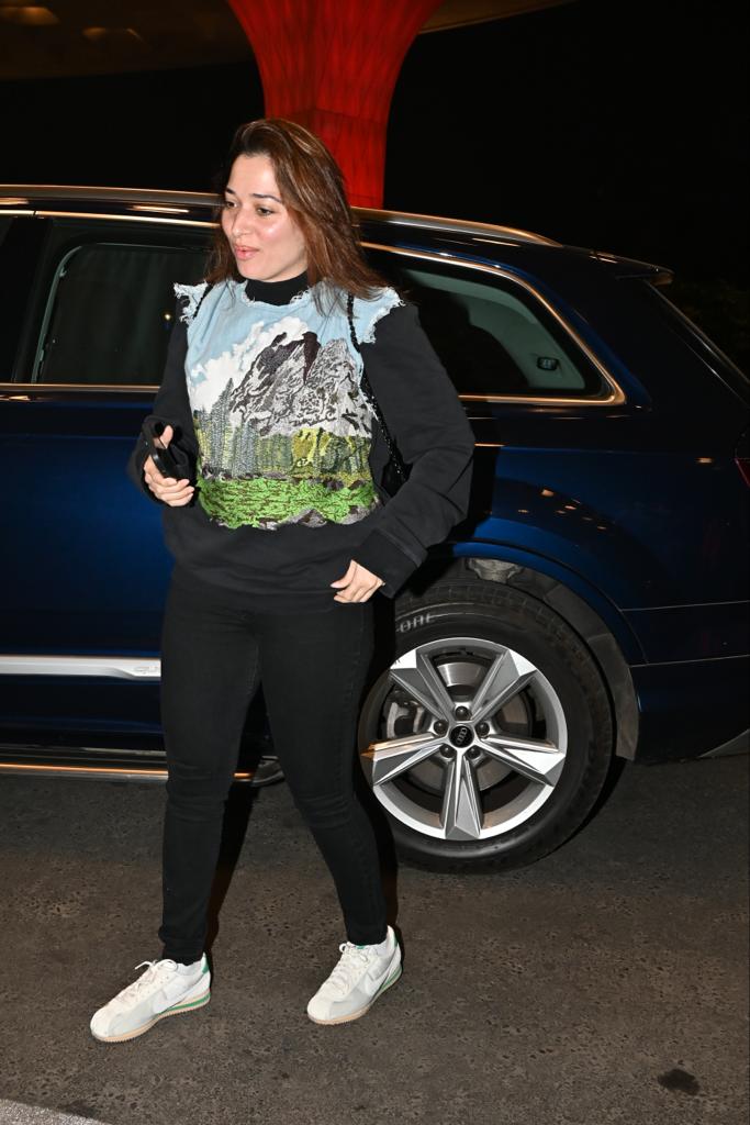 Tamannaah Bhatia looked stunning in black pants paired with a printed T-shirt as she got clicked at the airport