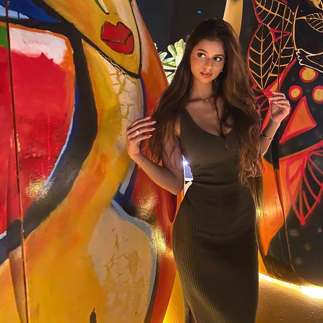 Suhana shared a photo on Instagram, striking a pose in a well-fitted bodycon dress. She opted for minimal makeup and left her hair down, showcasing her knack for pulling off bodycon dresses effortlessly.