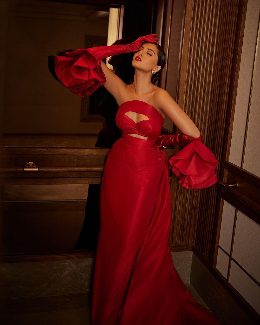 Tara Sutaria looked absolutely stunning in a gorgeous crimson gown by Lena Erziak, creating a perfect Christmas look.