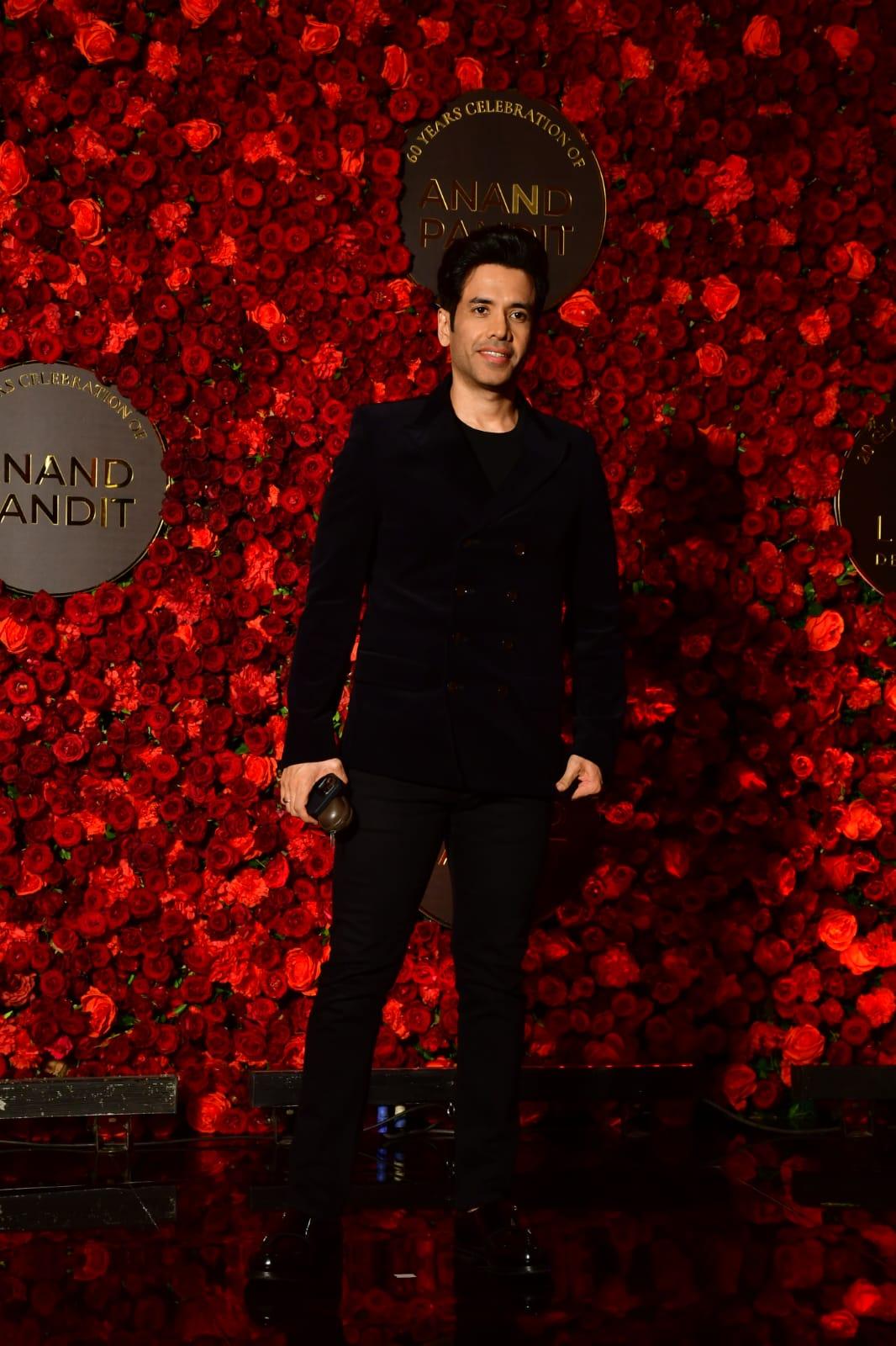 Tusshar Kapoor posed for the cameras in a black suit as he walked the red carpet