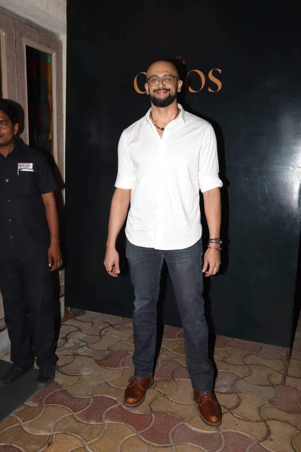 Arunoday Singh flashes a smile for the paparazzi at the party