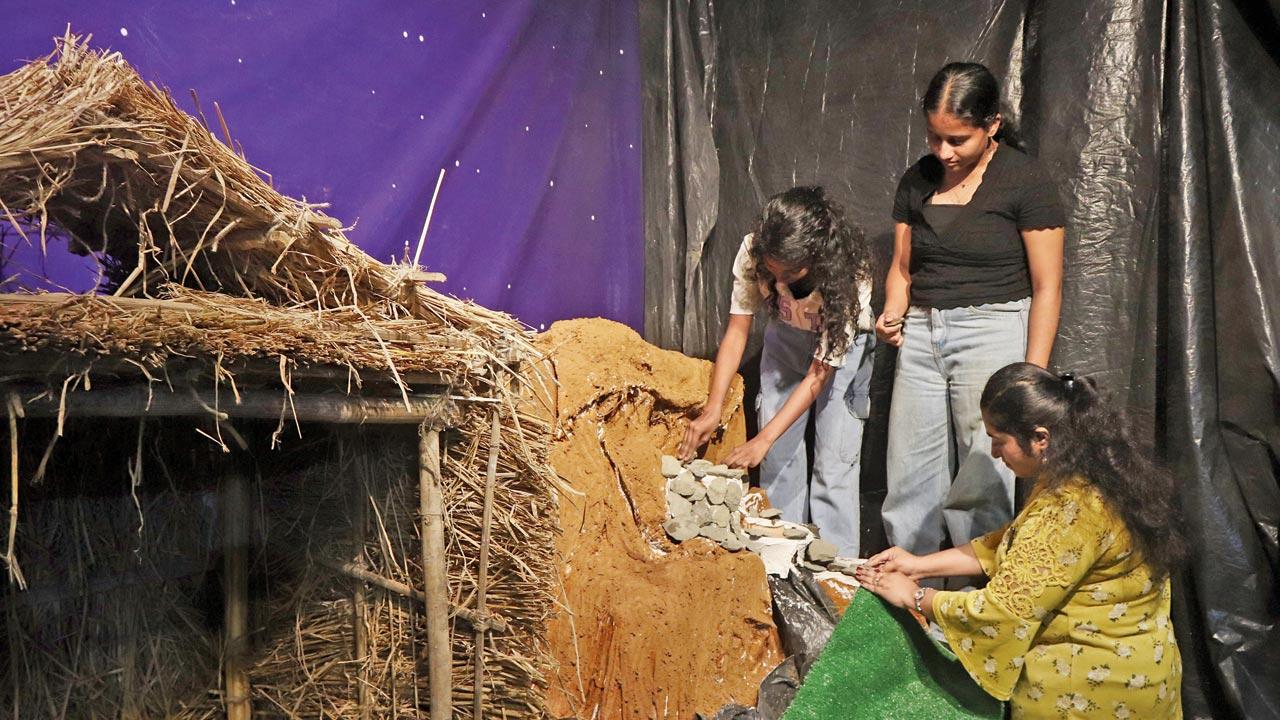 The scene is built with a mix of cardboard boxes, bamboo, wood and hay and provides the youth important social skills like working together in a team