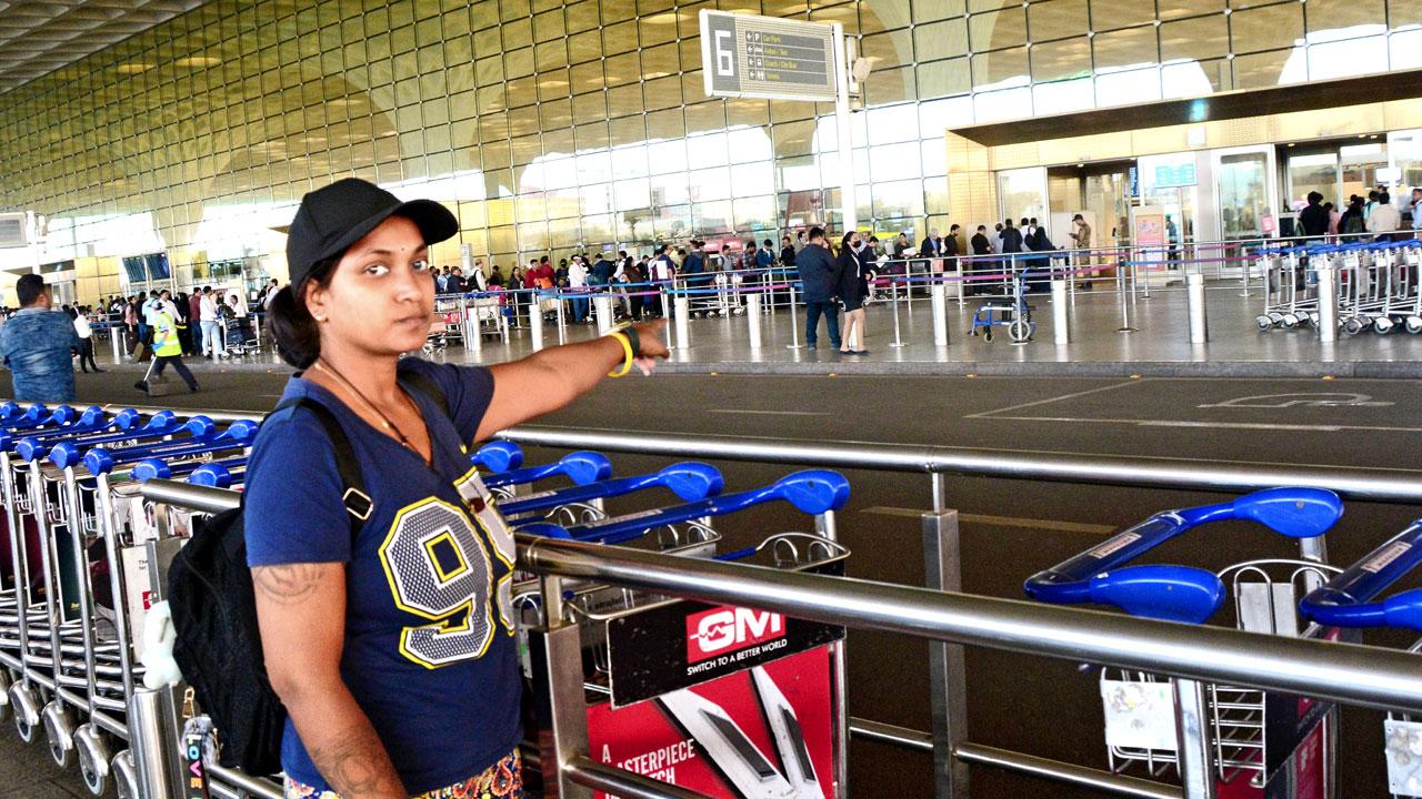 Rebecca Pillay shows the spot where her father stepped out of the Mumbai International Airport. Pic/Sayyed Sameer Abedi