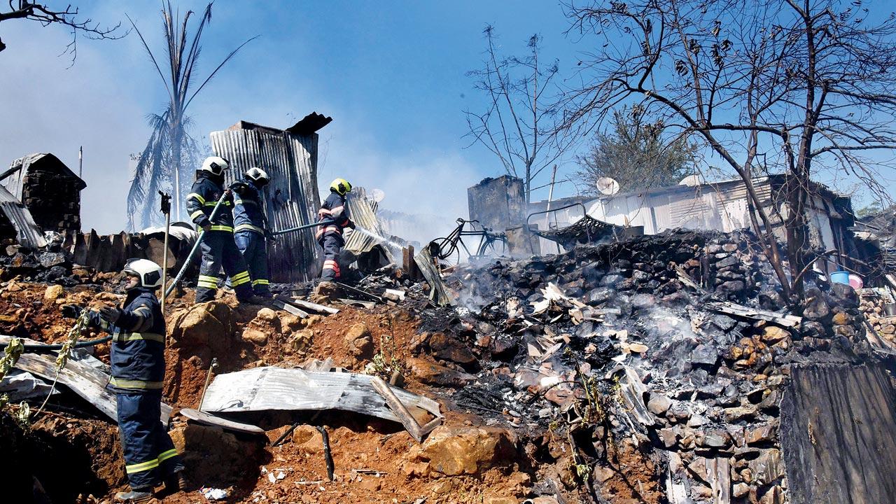 The deceased was trapped in one of the hutments and had inhaled smoke. Pics/Sameer Markande