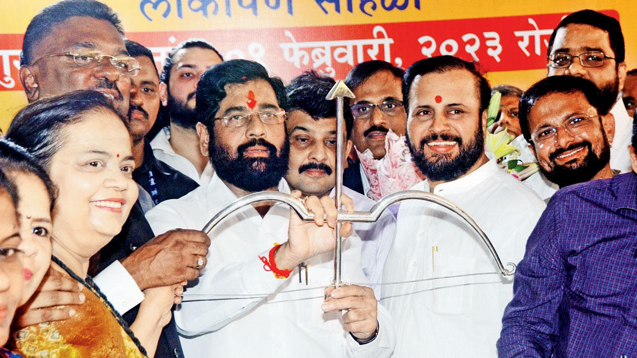 CM Eknath Shinde with the bow and arrow he was gifted earlier this month