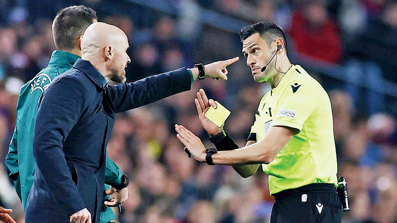 FC Barcelona’s Jules Kounde brings down Manchester United’s Marcus Rashford. United boss Erik Ten Hag believes referee Marian should have shown Kounde the red card for this strong challenge