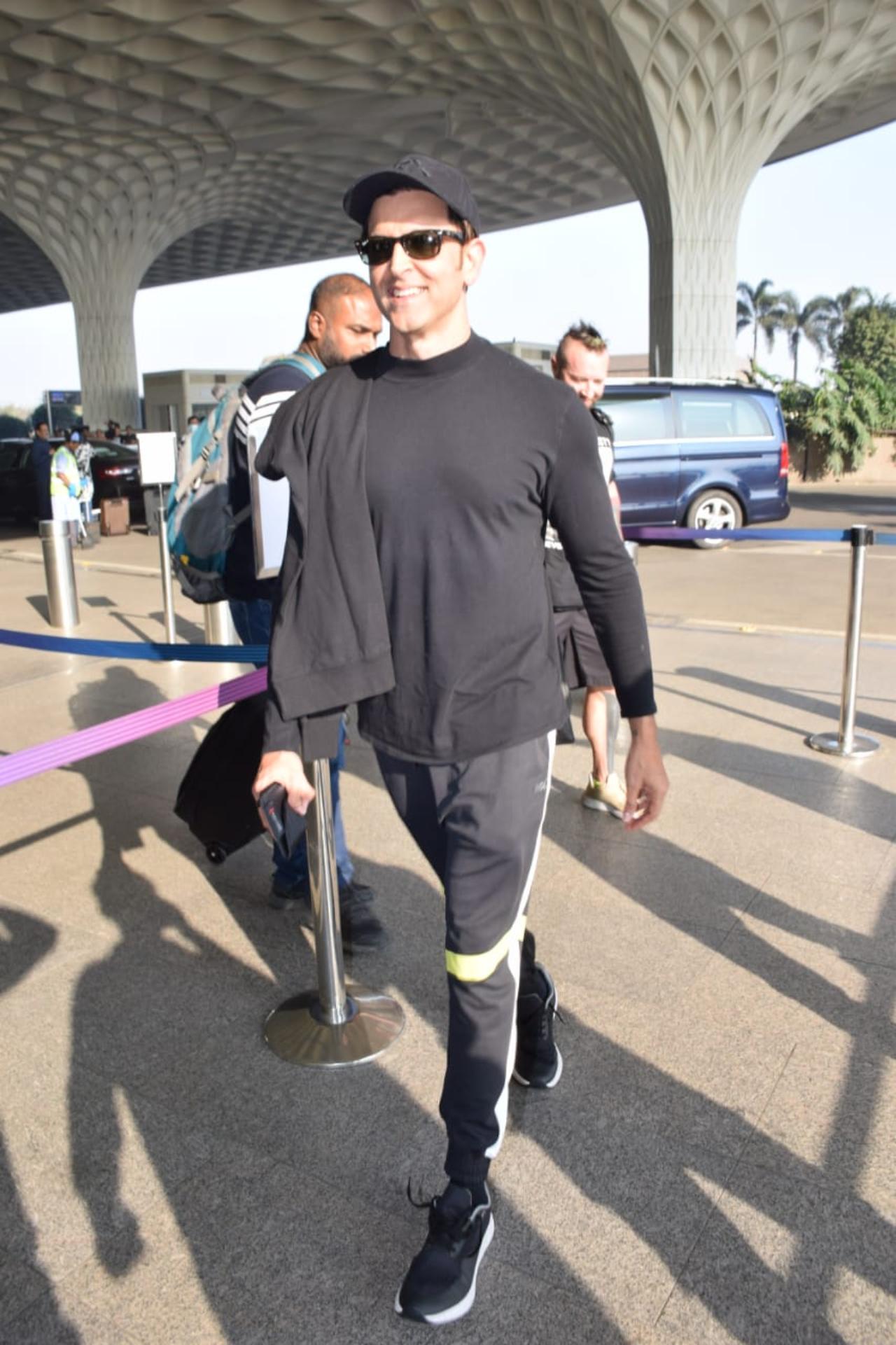 Hrithik Roshan was spotted at Mumbai aiport on Monday morning as he took off for the next schedule of his upcoming film 'Fighter'. He was spotted in an all-black  casual outfit for his flight