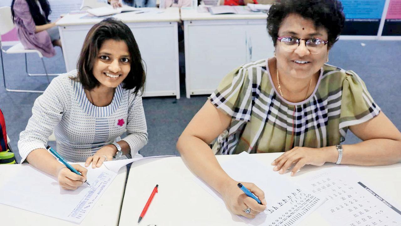 A mother-daughter duo at a previous Devanagari workshop