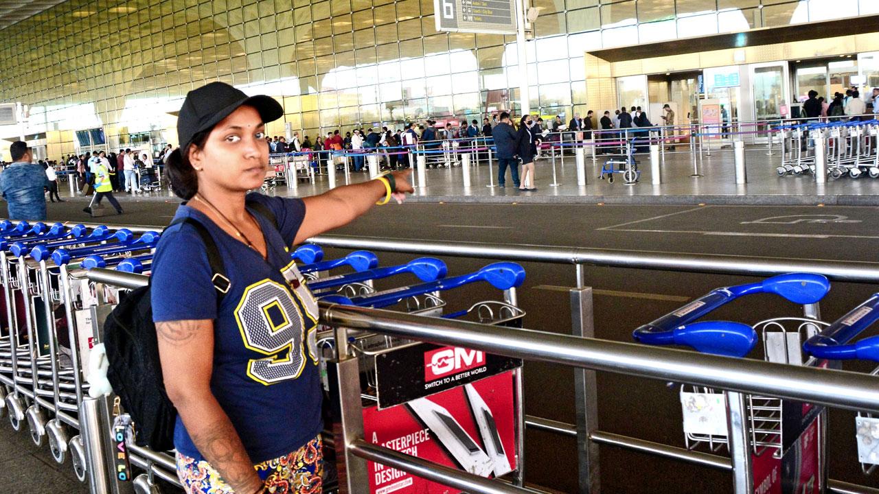 Rebecca Pillay shows the spot where her father stepped out of the Mumbai International Airport. File pic