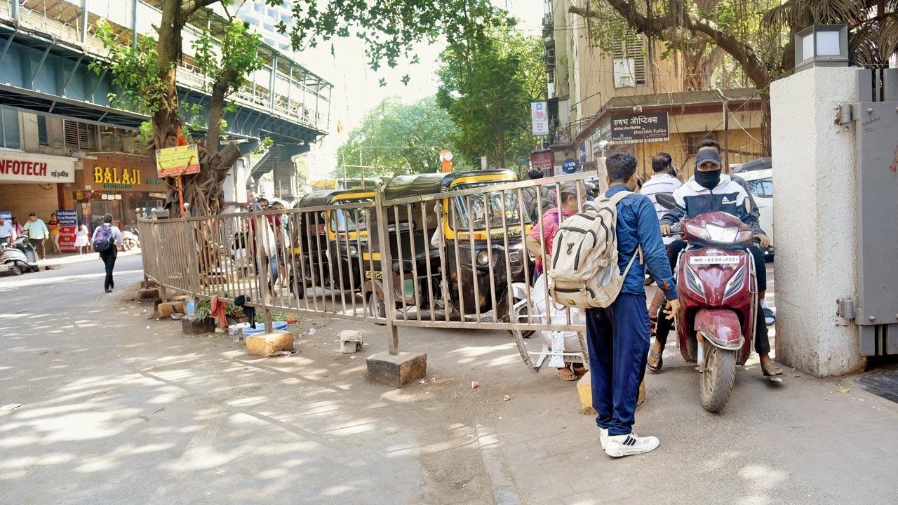 A tall steel railing had been erected as a divider, outside railway station, Ghatkopar East. Pic/Sameer Markande