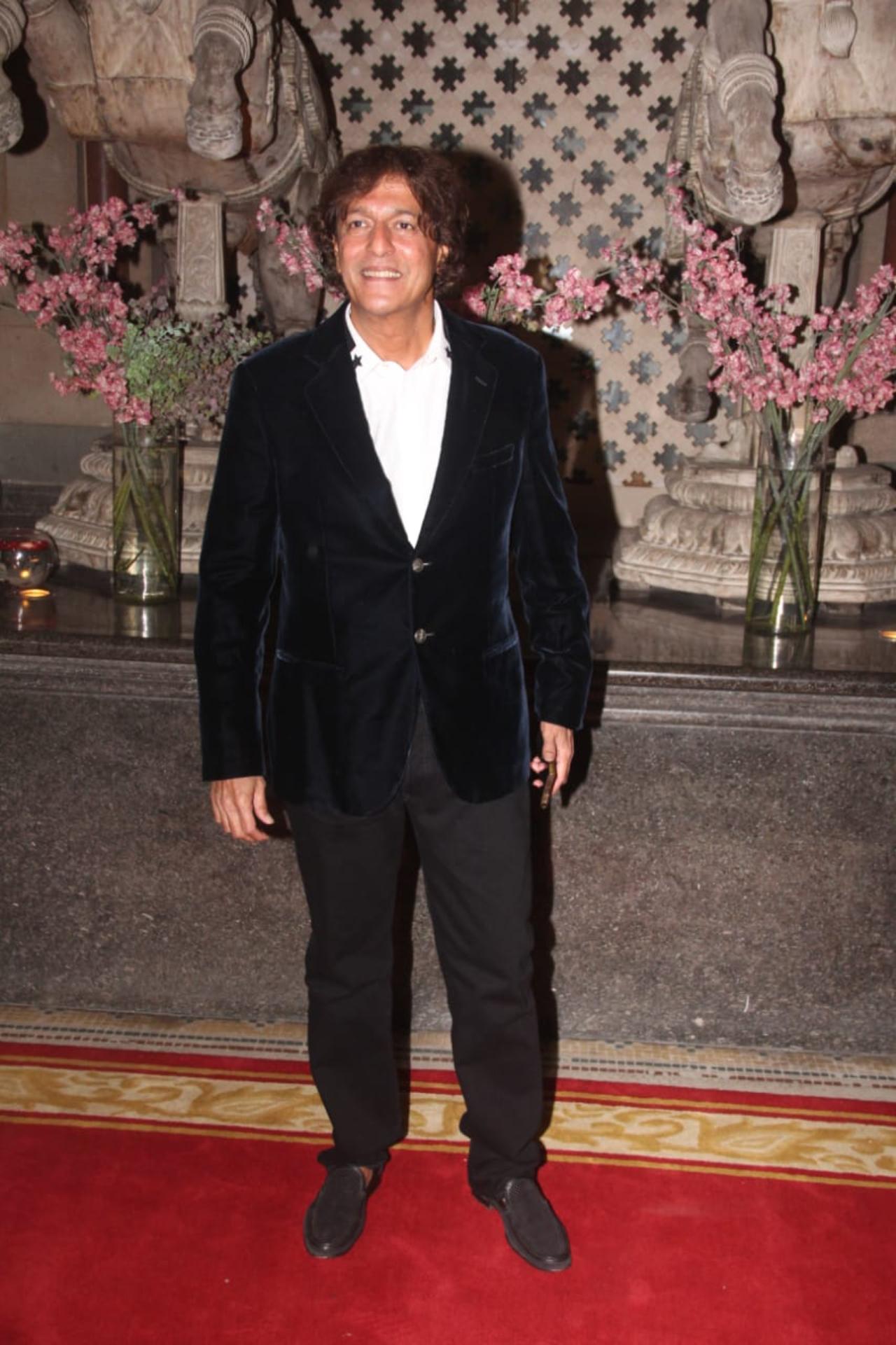 Chunky Panday was all smiles as he got clicked by the paps. He kept it simple in a black suit for the function
