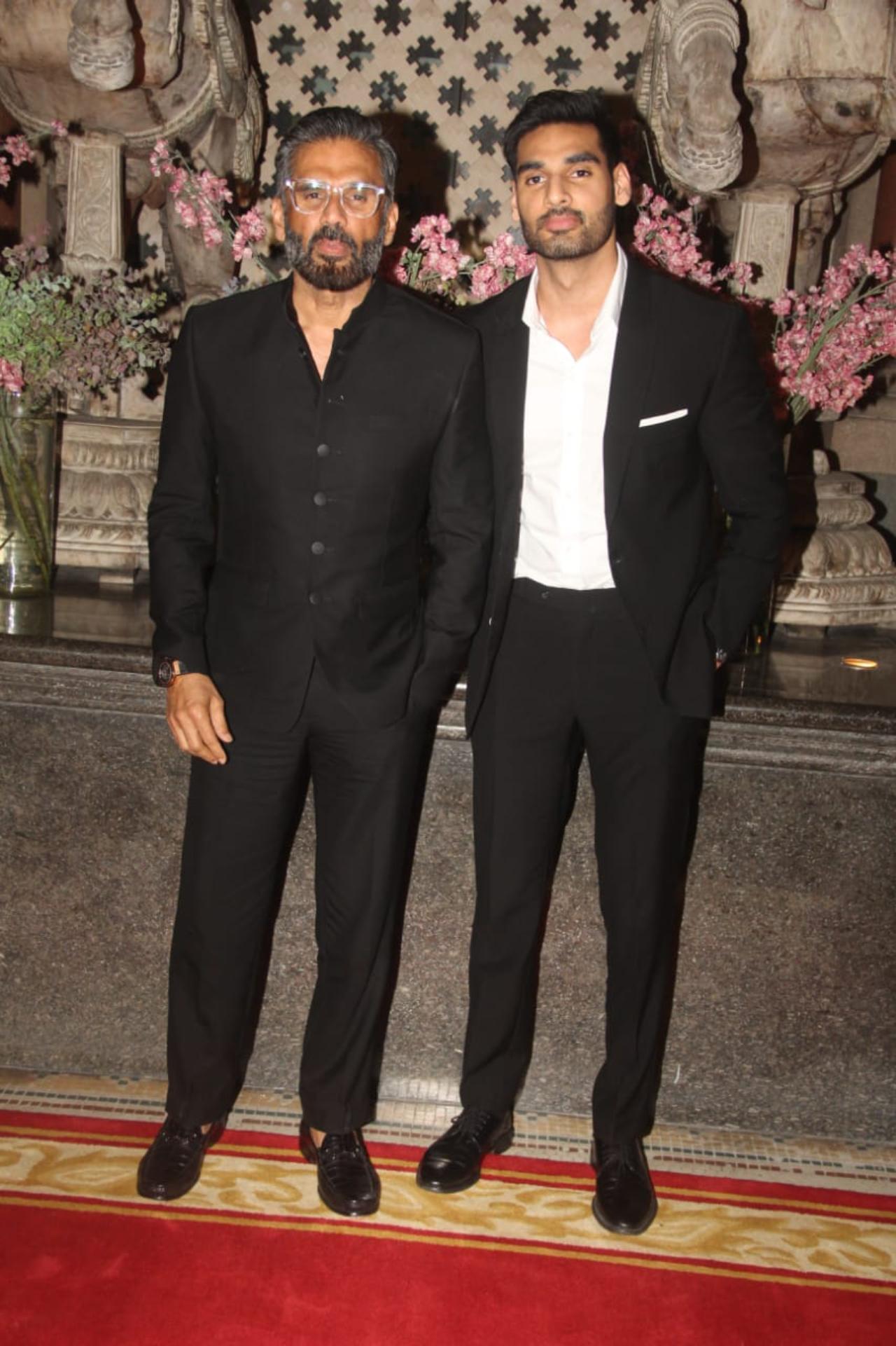 Suniel Shetty and his son Ahan Shetty twinned in black for the function. The father-son duo posed together for the paparazzi. Ahan recently made his debut with the film 'Tadap' that was released in 2021