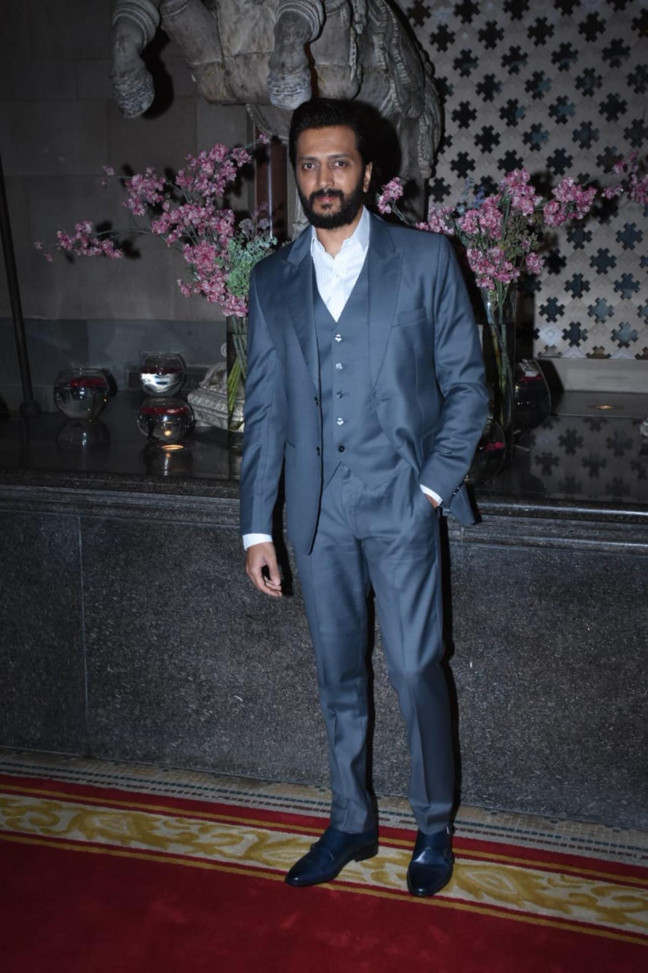 Riteish Deshmukh looked dapper in a grey suit. The actor who is reeling in the success of his recently released film Ved arrived solo for the party