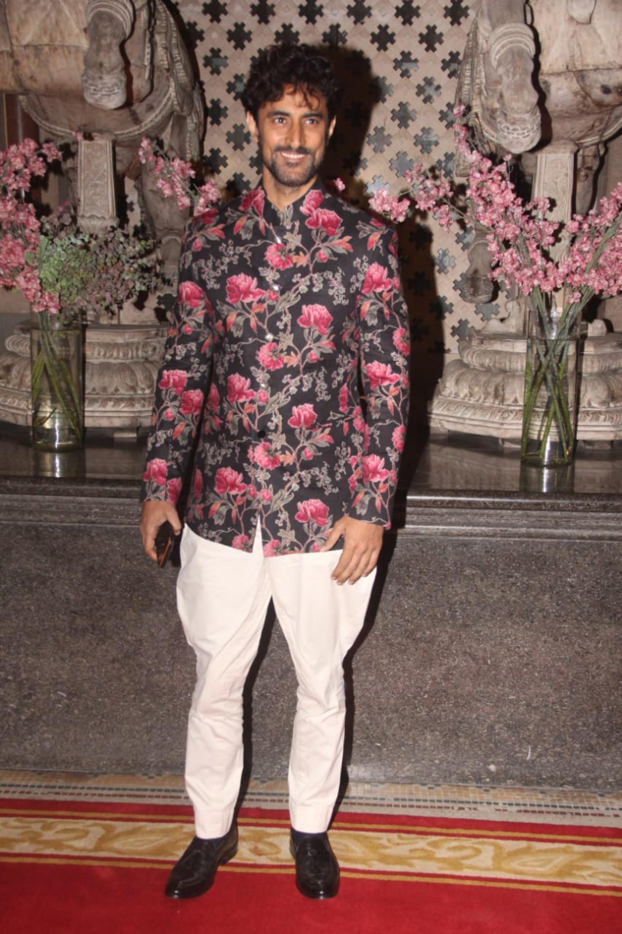 Kunal Kapoor went for a colourful printed kurta and white coloured dhoti styled pants