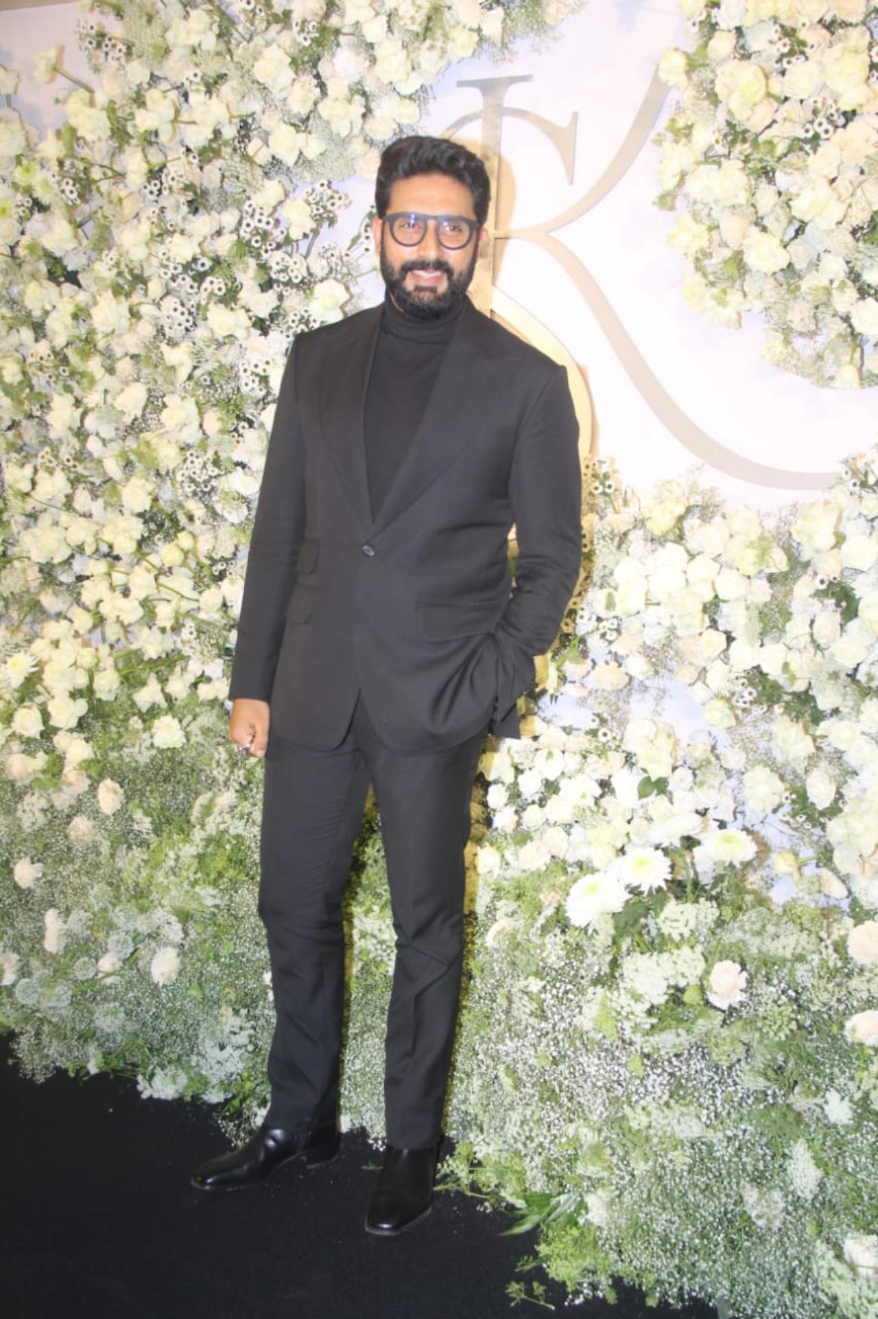 Abhishek Bachchan was among the first to arrive for the reception. He looked cool in a black suit