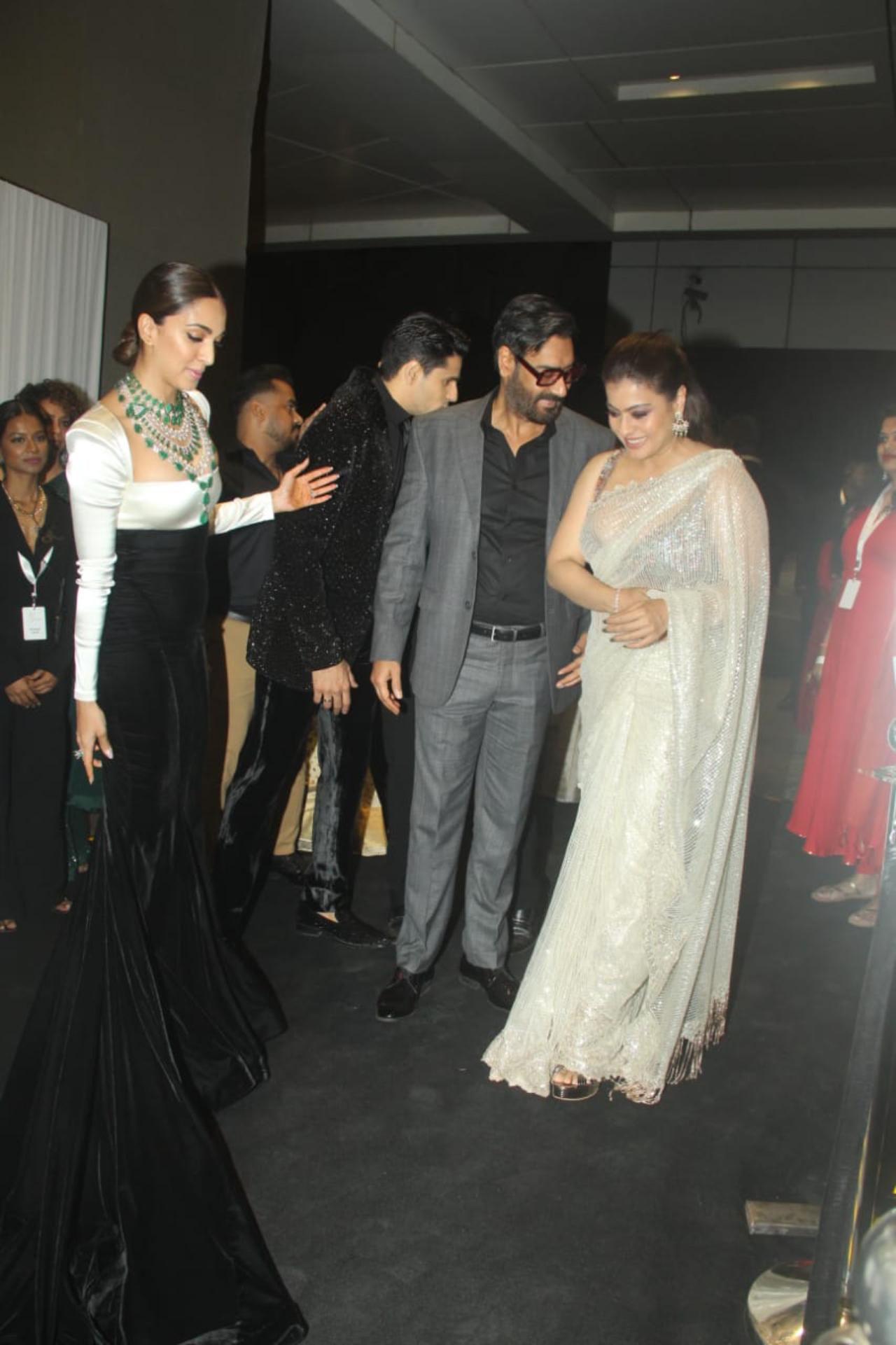 Kajol and Ajay Devgn arrived together for the party and were greeted by the newlyweds