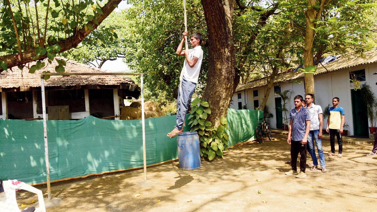 Apprentice trainees on the climbing ropes at the new AJS at Mahalaxmi race course