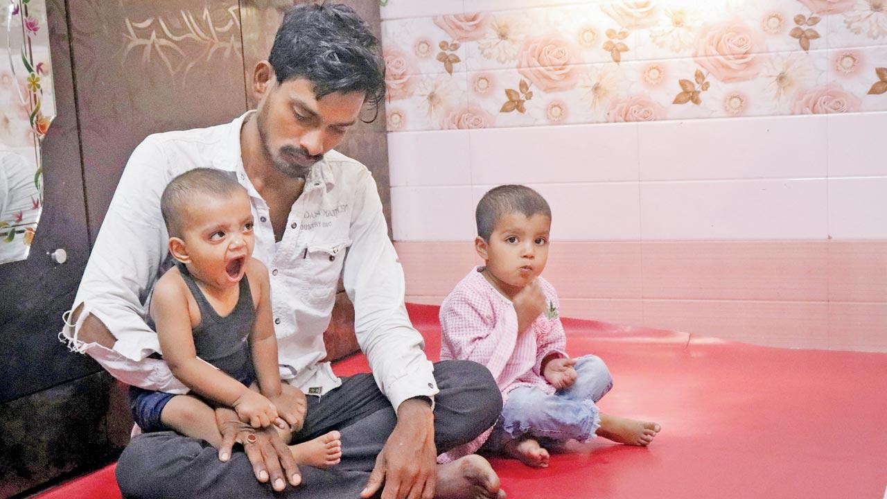 Rawwab Shaikh and his daughters Anayza and Zunaira (in pink) at Kamla Raman Nagar in Govandi. Pics/Anurag Ahire