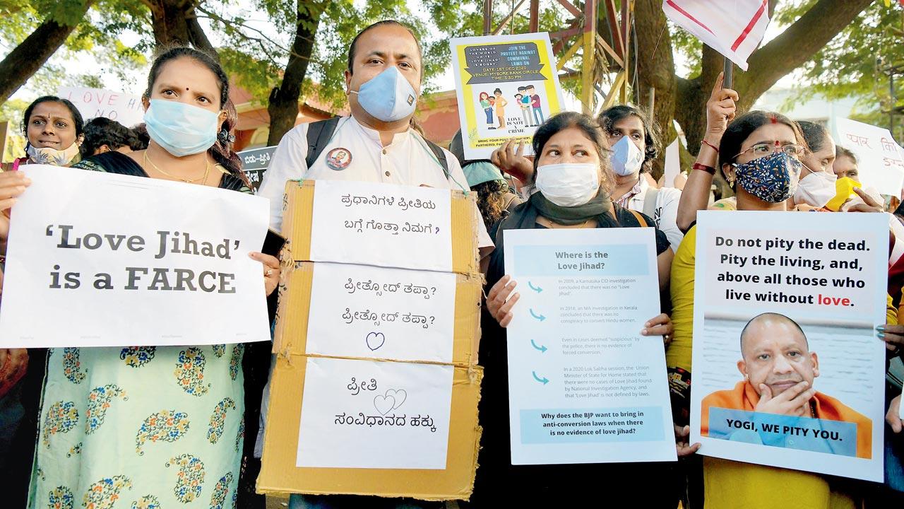Women and human rights organisations are seen here protesting against anti-love jihad laws in Bengaluru on December 1, 2020. Pic/Getty Images