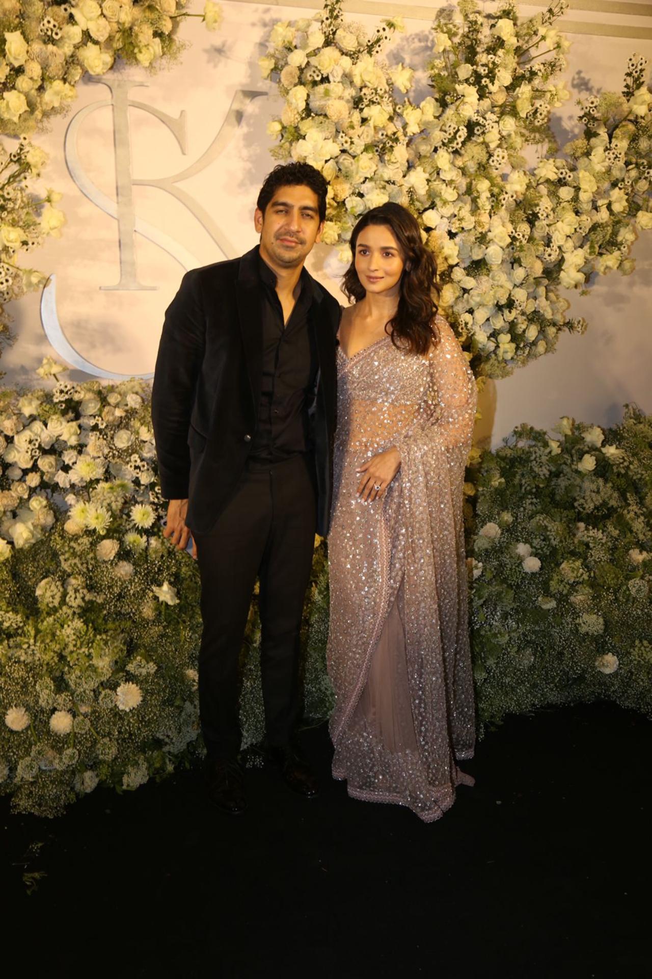 Alia Bhatt looked stunning in a shimmery pink saree. She was accompanied by her good friend and filmmaker Ayan Mukerji