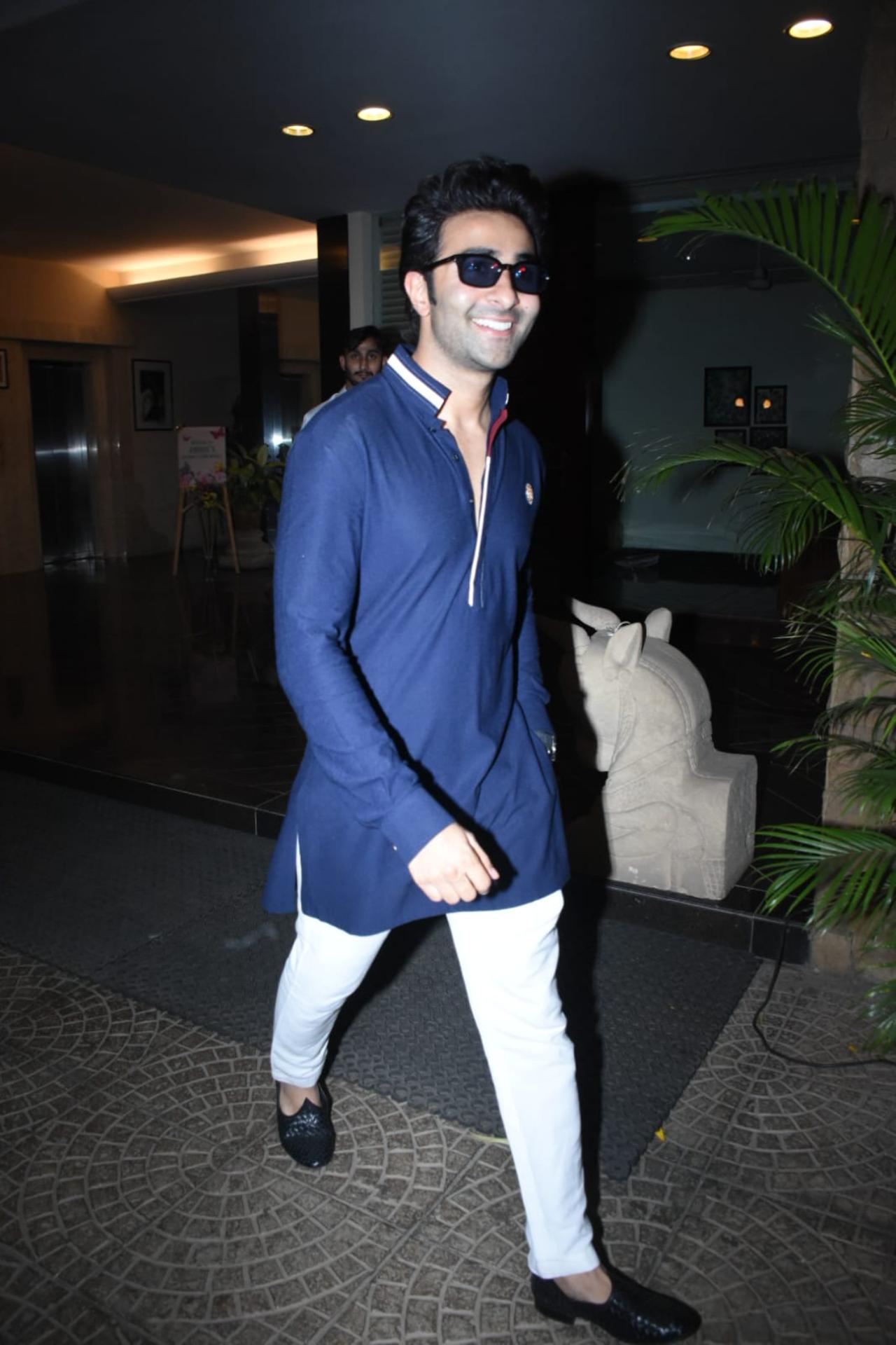 Armaan Jain's brother Aadar Jain was also seen at the shower. He was all smiles as he was seen dressed in a blue kurta with black shades