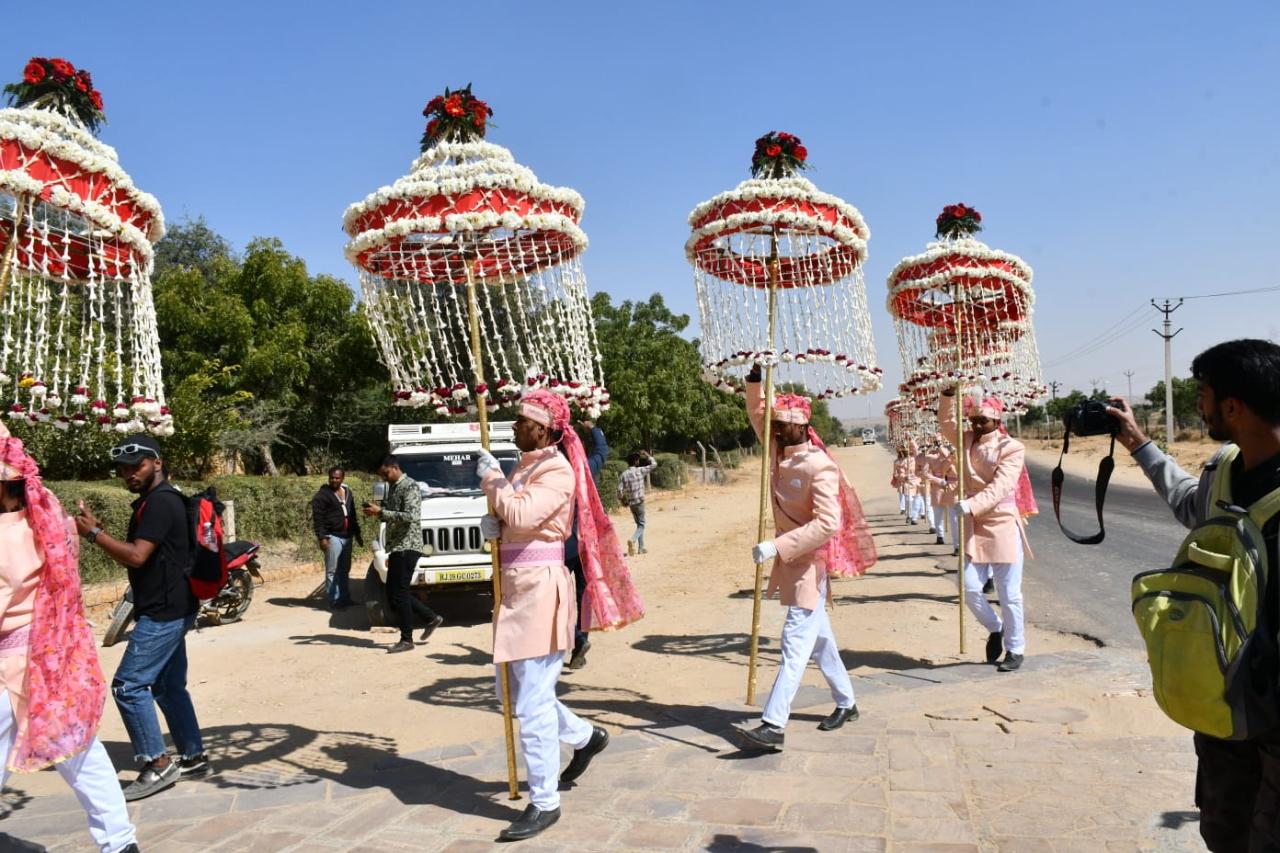 The Band Baaja unit were seen in pink uniform and walking in a straight line towards the palace