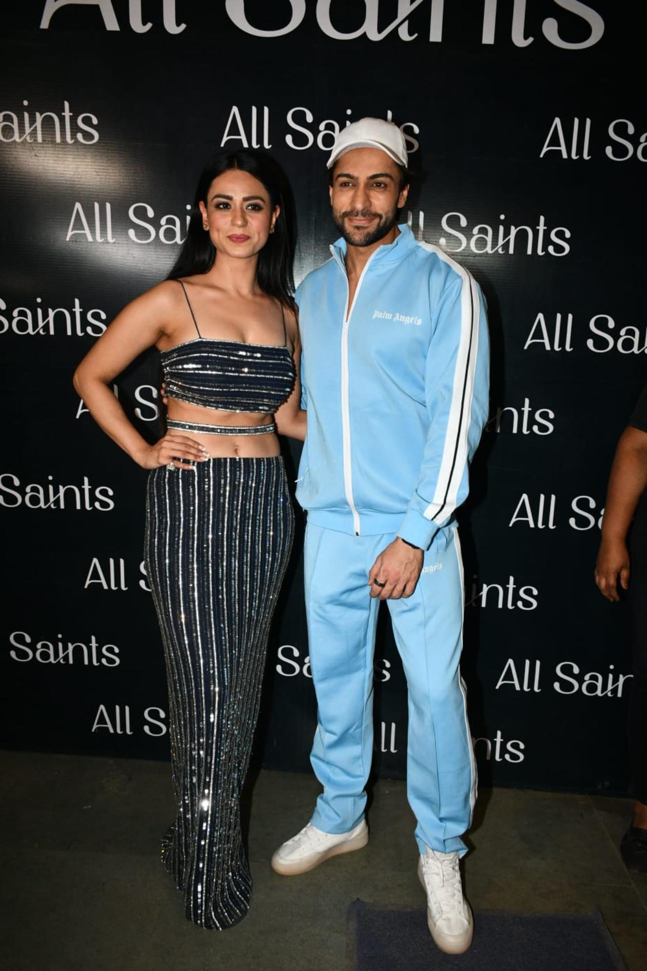 Shalin Bhanot, who was in the top 5 was seen in athleisure wear. He posed along with the gorgeous Soundarya Sharma before heading into the party. Soundarya looked stunning in a black-striped outfit with a bralette top