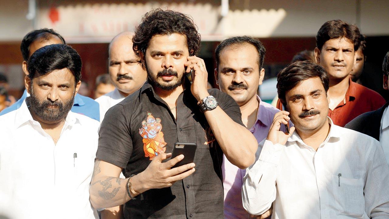 Former Rajasthan Royals player S Sreesanth walks out of Patiala House Court after the court exonerated him, Ajit Chandila and Ankit Chavan from the Indian Premier League 2013 spot-fixing scandal and cheating charges levelled upon them by Special Cell Delhi Police, on July 25, 2015 in New Delhi. In 2013, the BCCI disciplinary committee order had banned the fast bowler for life. Pic/Getty Images