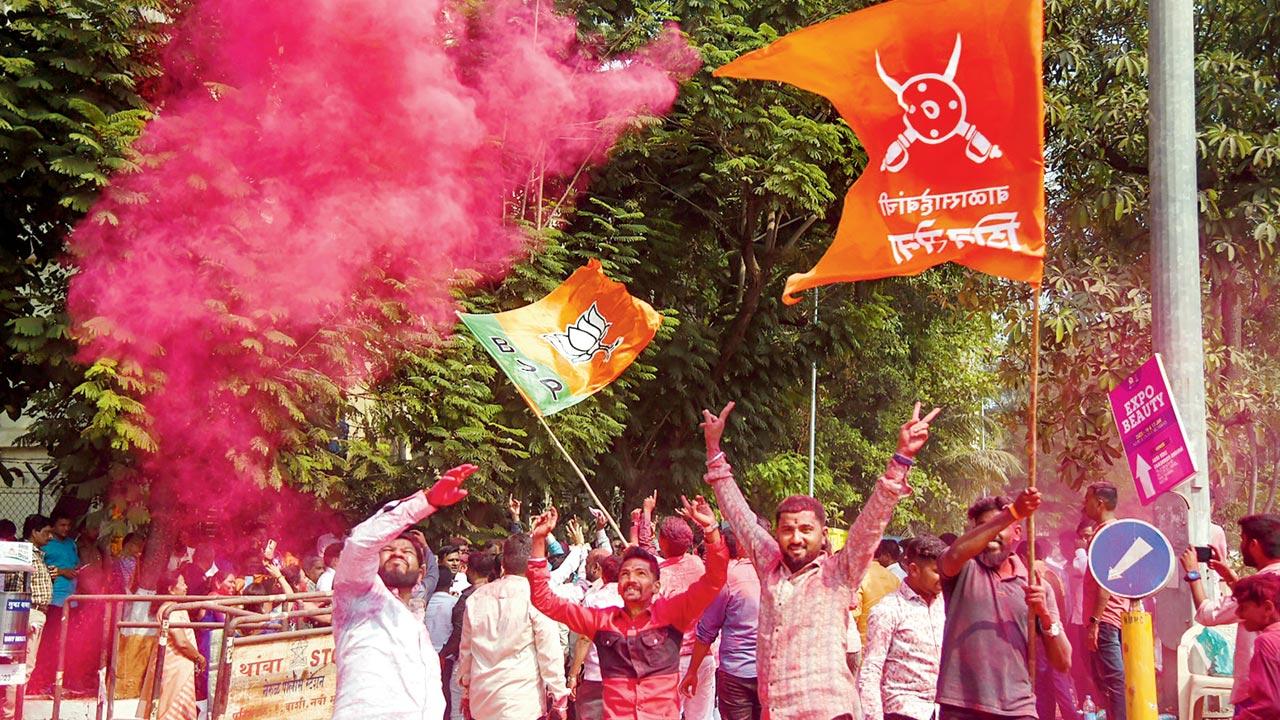 Supporters of BJP leader Dnyaneshwar Mhatre celebrate after he won from Konkan seat in the MLC elections, in Navi Mumbai, on Thursday. Pic/PTI