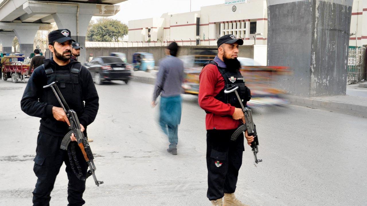 Pakistan says mosque bomber wore police uniform