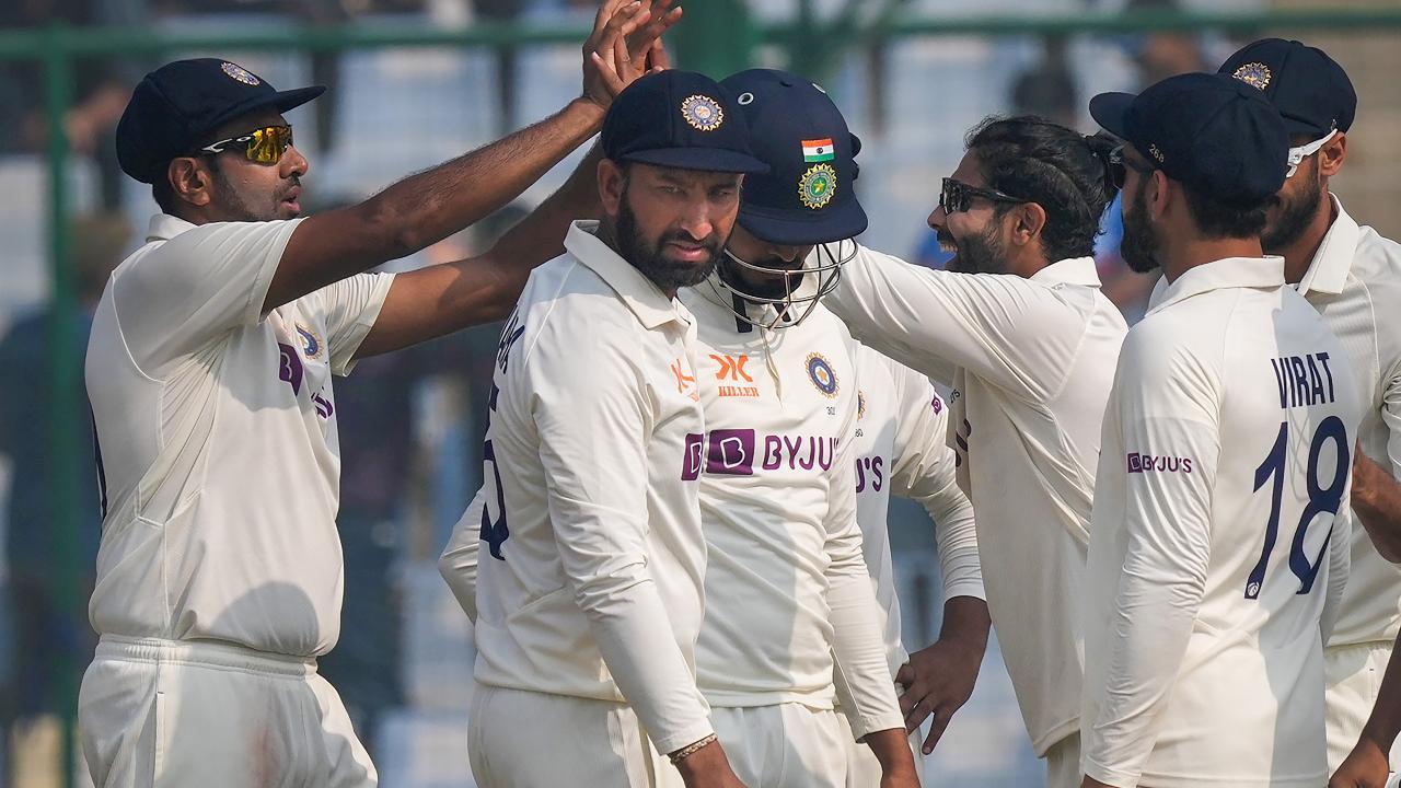 Indian Player Ravindra Jadeja celebrates with teammates after dismissing Pat Cummins (C) during the third day of the 2nd test cricket match between India and Australia, at the Arun Jaitley Stadium, in New Delhi, Sunday, Feb. 19, 2023. (Pic Courtesy: PTI)