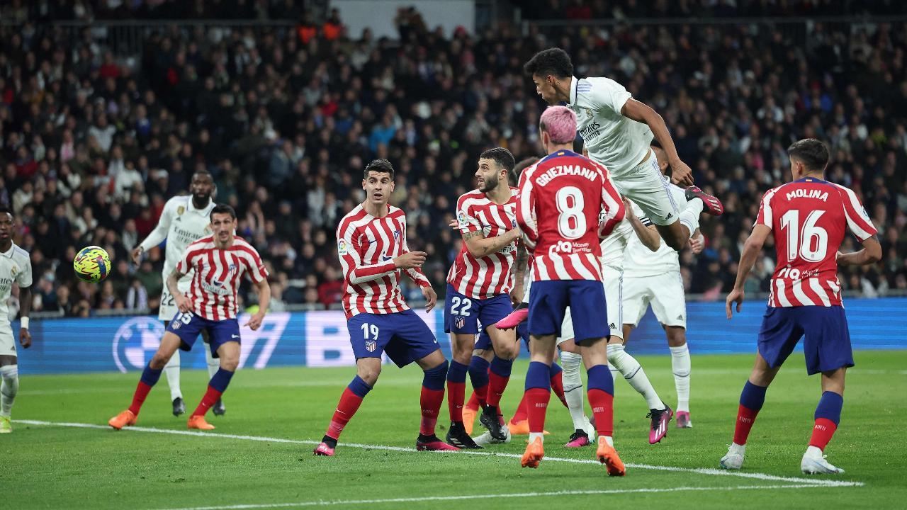 Real Madrid scores late to draw with 10-man Atletico