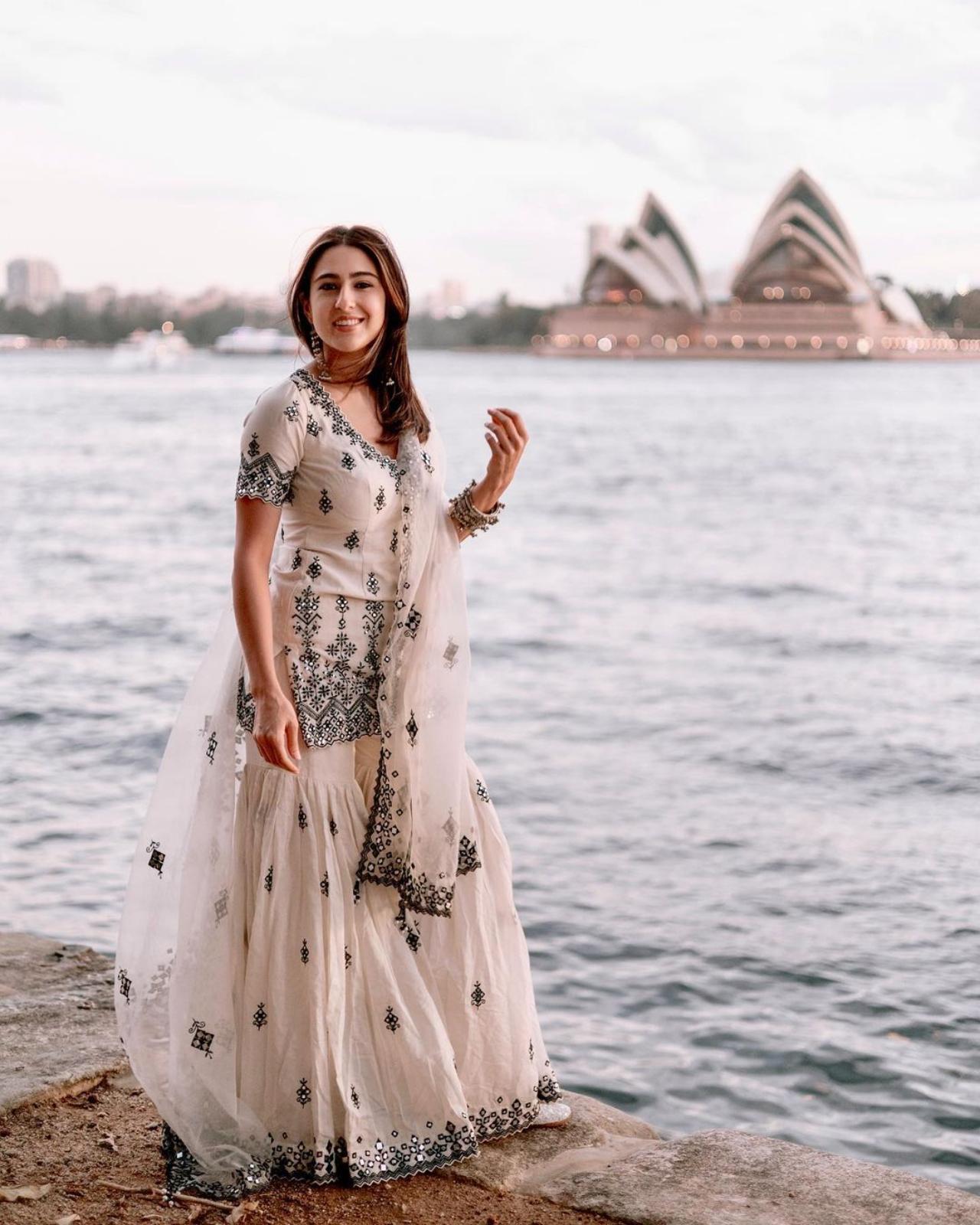 Sara went all desi with a white sharara and posed in the beautiful locations of Sydney. She completed her look with bangles and earrings