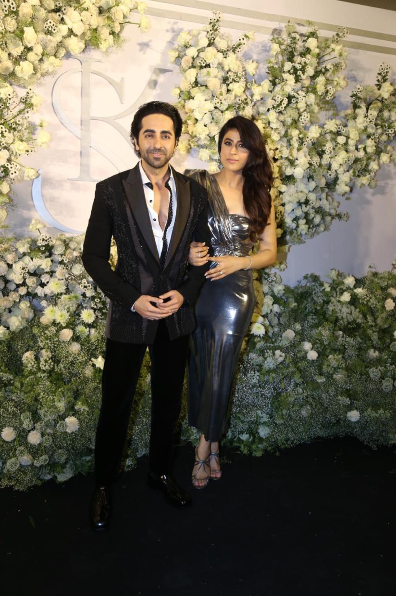 Ayushmann Khurrana came dressed in black. He was accompanied by his wife Tahira who looked gorgeous in a silver metallic dress
