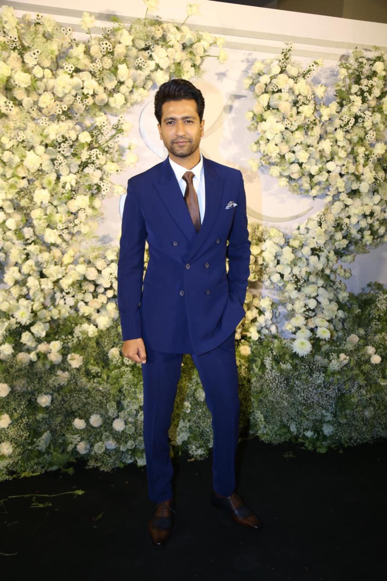 Vicky Kaushal looked smart in a blue suit. He arrived solo for the party