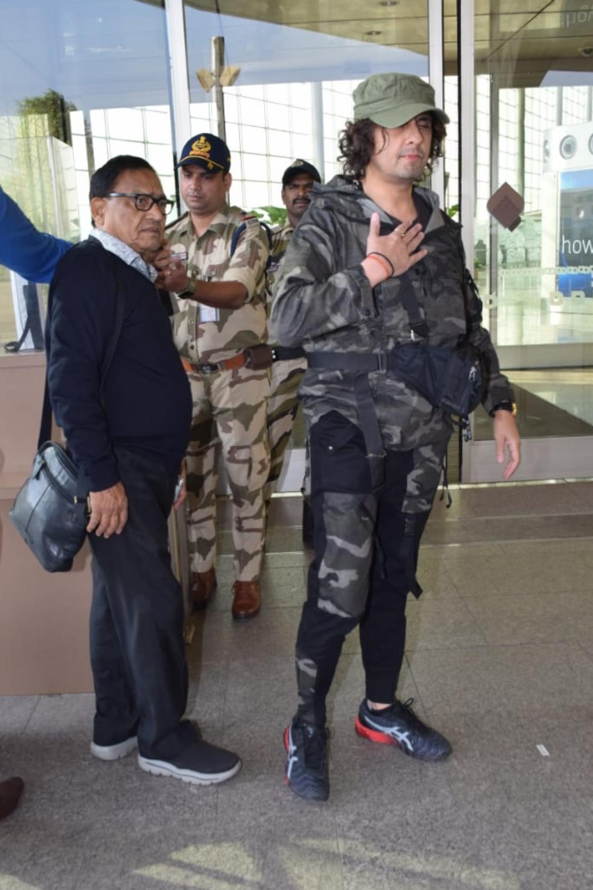 After the crazy brawl in Chembur, the songster made his first public appearance at the Mumbai airport on Tuesday morning. Dressed in a stylish camouflage co-ord set, the singer appeared perfectly fine as he made his way to the entry gate of the airport. The singer even obliged paps with some photos. 