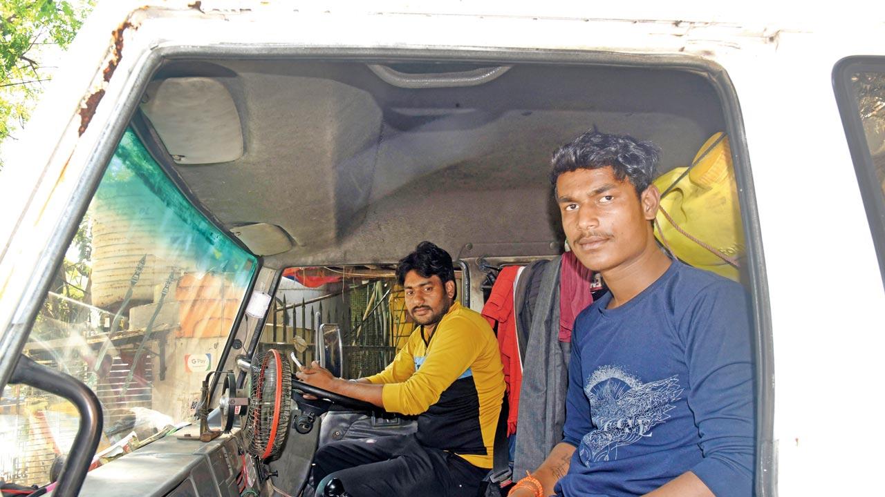 Driver Kallu Yadav (with helper Deepak Kol) works from 8 am to 8 pm, supplying water between Nepean Sea Road and BKC