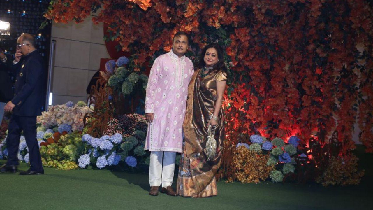Anil Ambani was dressed in pink kurta while his wife was seen in a electric golden brown saree. 
