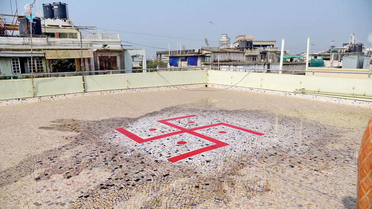 The redone mosaic on the terrace with the Swastik symbol. PICS/PRADEEP DHIVAR