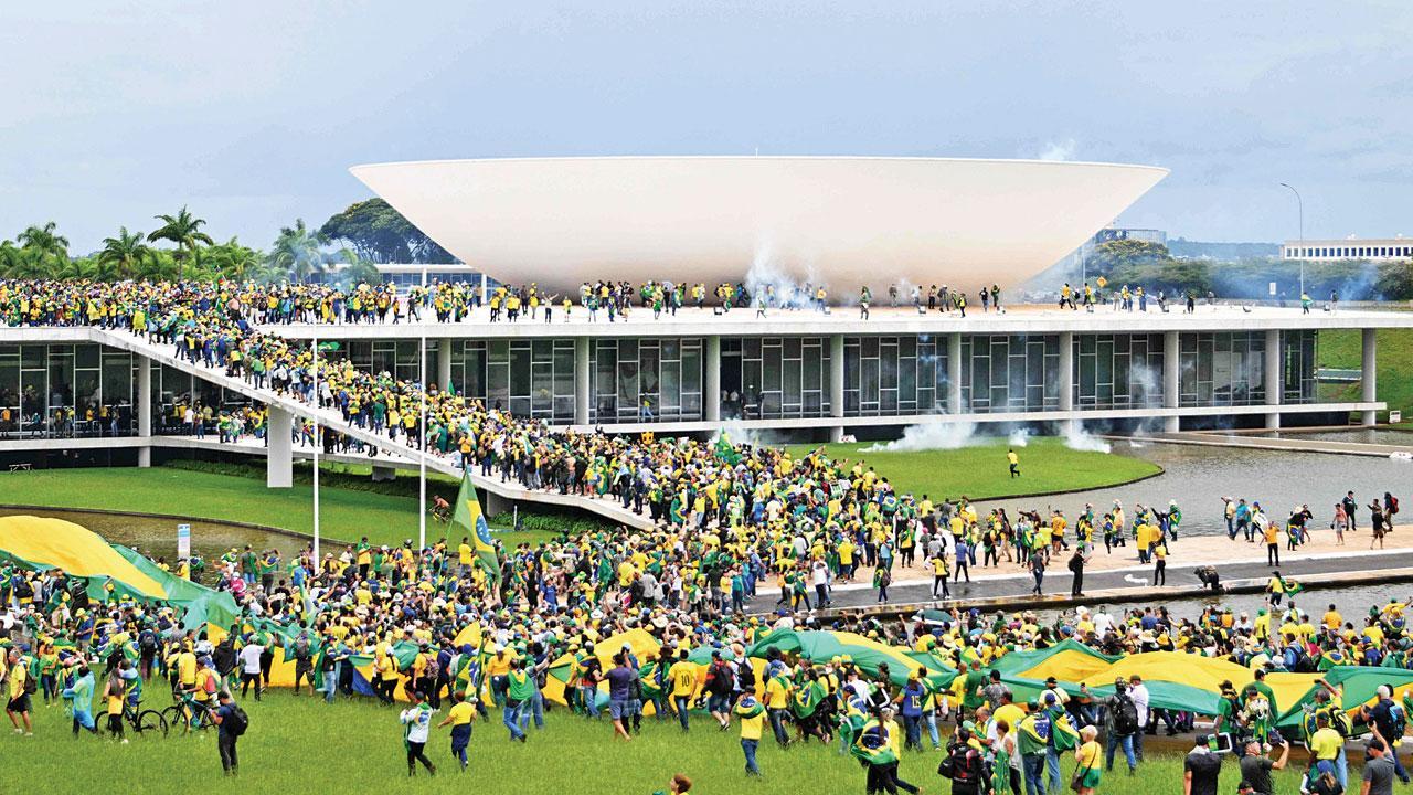 Pro-Bolsonaro rioters storm Brazil’s govt offices