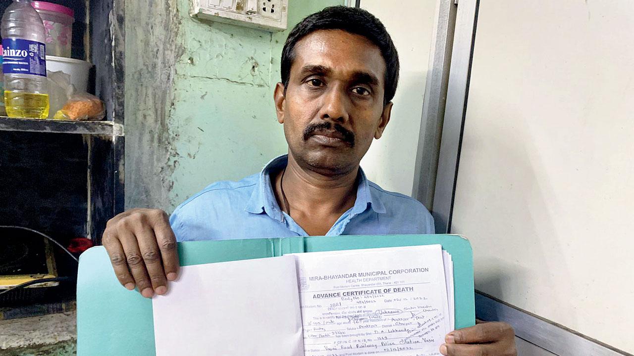 Birendra Chauhan shows the death certificate of his minor son