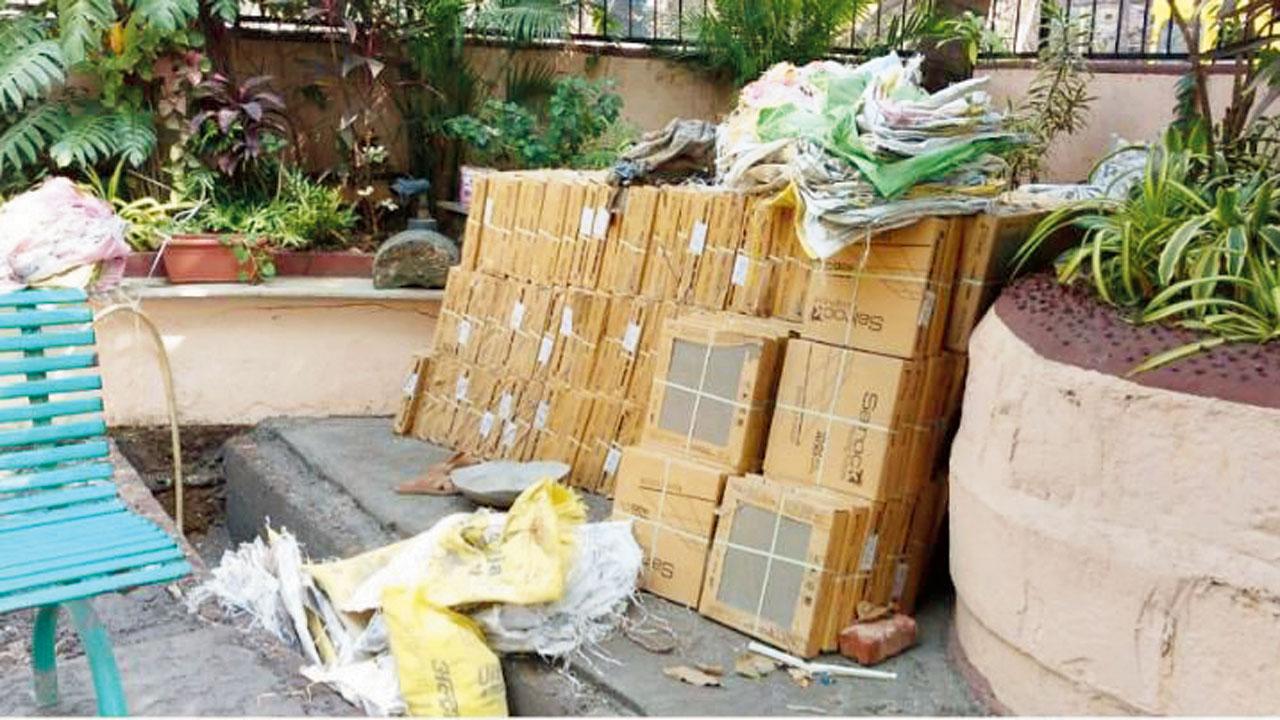 Ceramic tiles kept on the Bhikha Behram Well premises. Pic/Zoru Bhathena