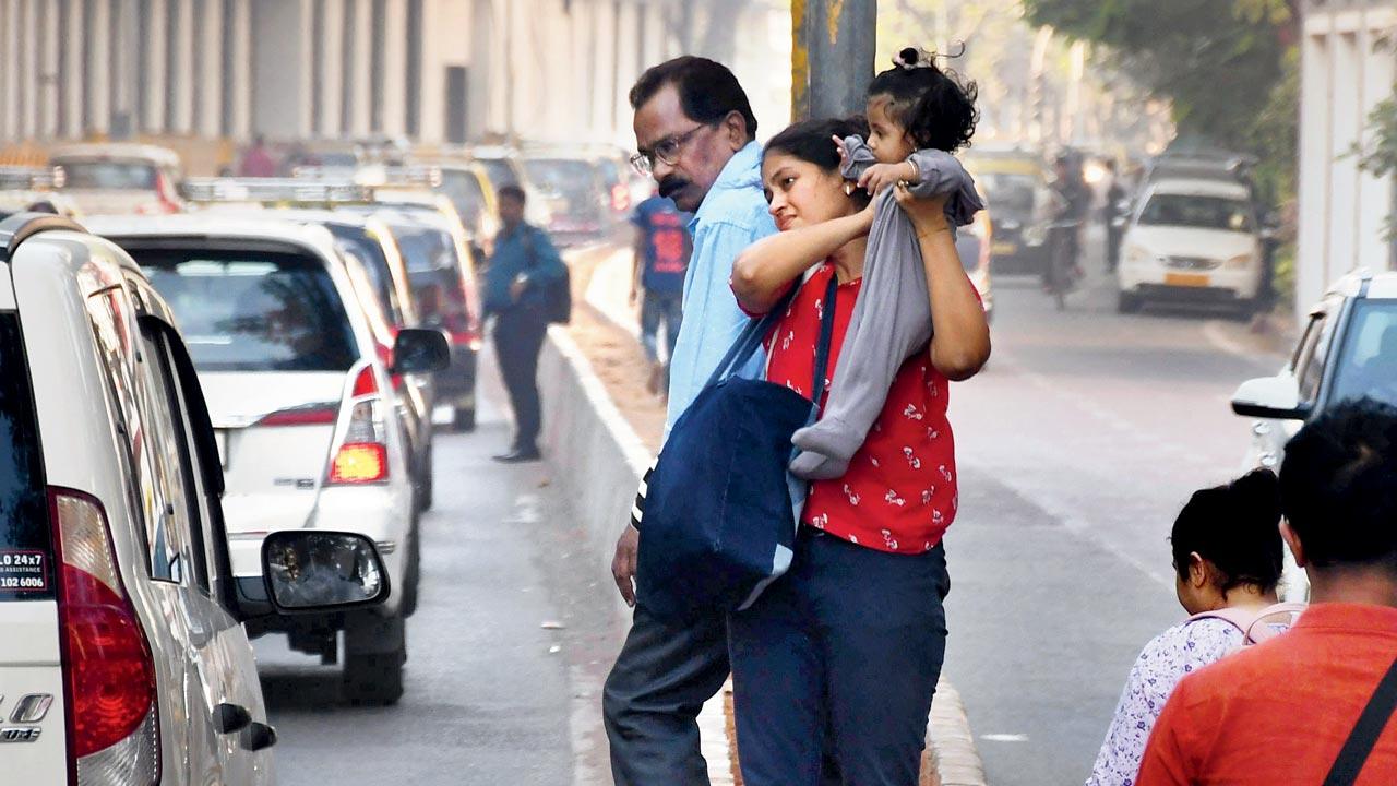 Pedestrians crossing Maharshi Karve Road are having a difficult time. Pic/Ashish Raje