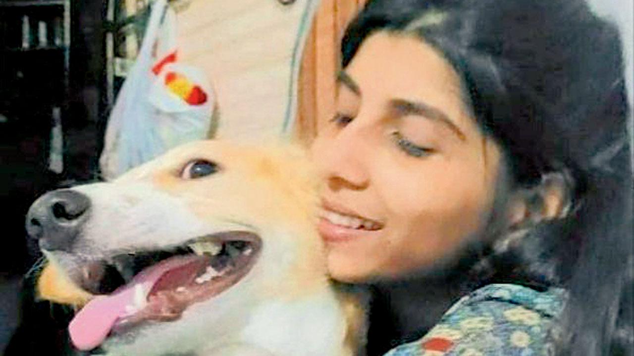 An undated photo of Simran Yadav with Simba, the pet dog