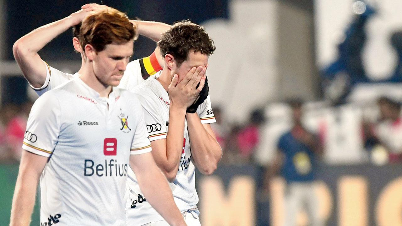 Belgium’s Gauthier Boccard (left) and Nicolas de Kerpel wear a dejected look after the defeat to Germany